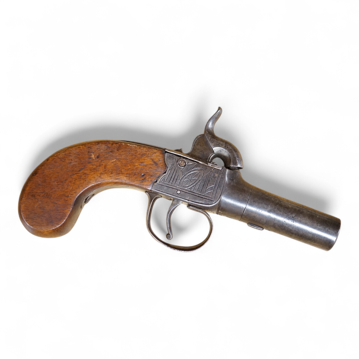 A boxlock percussion pocket pistol with turn off barrel, Birmingham proofs, trophy engraved frame, and slab walnut butt